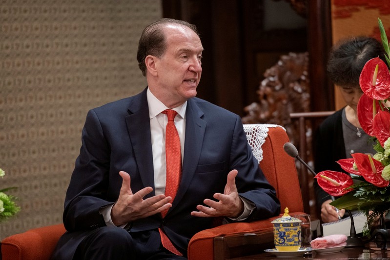 FILE PHOTO: World Bank President David Malpass speaks to Chinese Premier Li Keqiang during a meeting at Zhongnanhai in Beijing, China