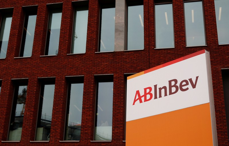 FILE PHOTO: The logo of AB InBev is pictured outside the brewer's headquarters in Leuven