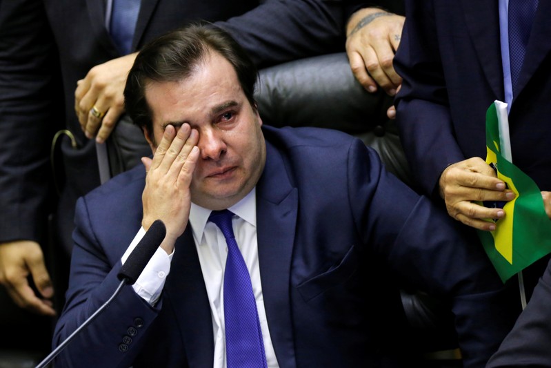 Brazil's Lower House President Rodrigo Maia is seen crying during a session to vote the pension reform bill at plenary of the Chamber of Deputies in Brasilia