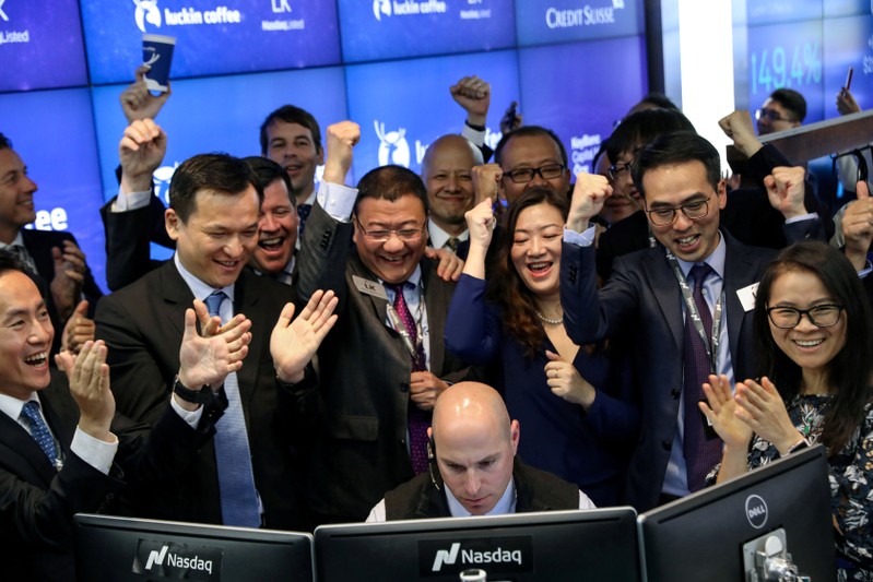 FILE PHOTO: Jenny Qian Zhiya CEO of Luckin Coffee celebrates the company's stock trading during the IPO at the Nasdaq Market site in New York