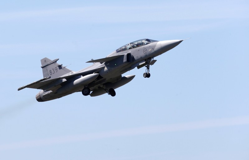FILE PHOTO: Sweden's Air Force Saab JAS 39 Gripen fighter takes off during the AFX 18 exercise in Amari military air base