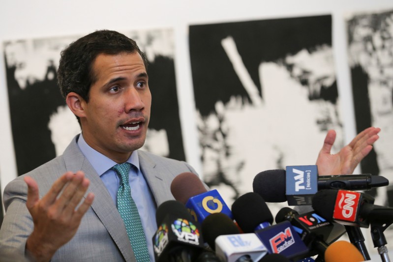 Venezuelan opposition leader Juan Guaido, who many nations have recognised as the country's rightful interim ruler, attends a meeting with representatives of Venezuela's private industrial sector in Caracas