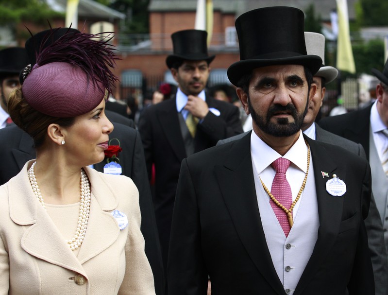 Jordanian Princess Haya bint Al-Hussein and husband, Dubai ruler Sheikh Mohammed bin Rashid al-Maktoum, arrive for Ladies Day, the third day of racing at Royal Ascot in southern England
