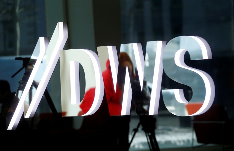 FILE PHOTO: The new logo of Deutsche Bank's DWS Asset Management is pictured at their headquarters in Frankfurt
