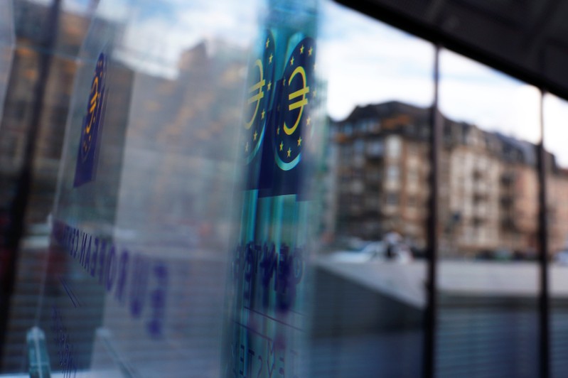 Reflection of the sign of the European central Bank (ECB) is seen ahead of the news conference on the outcome of the Governing Council meeting, at the ECB headquarters in Frankfurt
