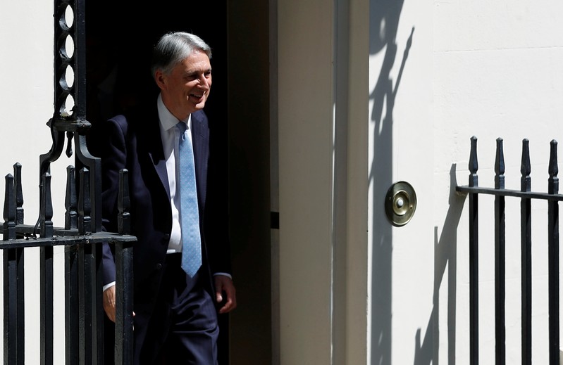 Chancellor of the Exchequer Philip Hammond leaves Downing Street in London