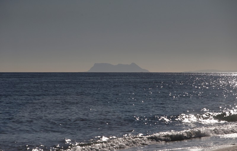 FILE PHOTO: The Rock of Gibraltar, historically claimed by Spain, is seen from El Saladillo beach in Estepona