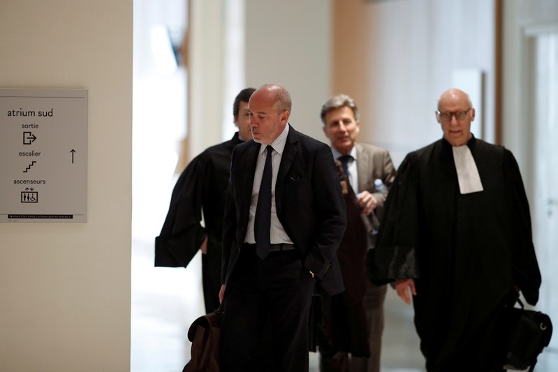 FILE PHOTO: French telecom group Orange CEO Stephane Richard arrives for a trial over a disputed state payment at the Paris courthouse