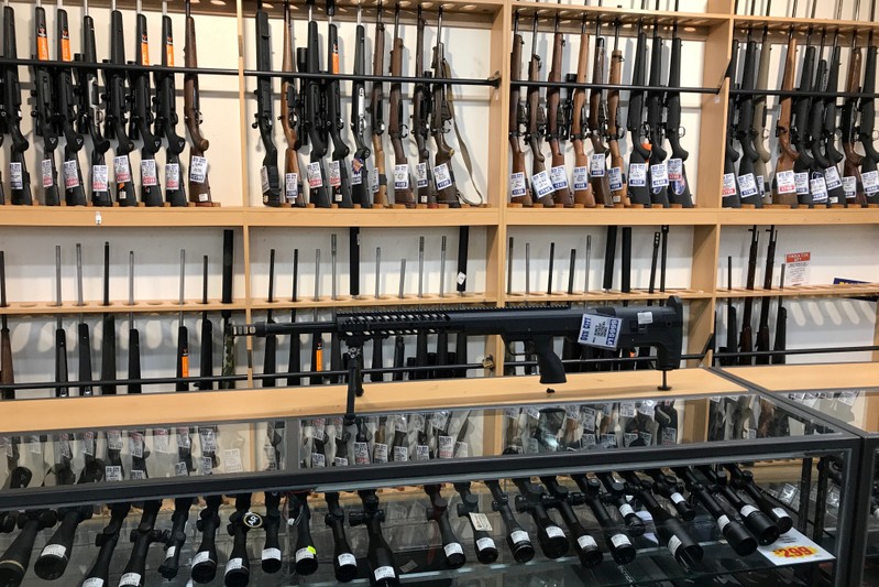 FILE PHOTO: Firearms and accessories are displayed at Gun City gunshop in Christchurch