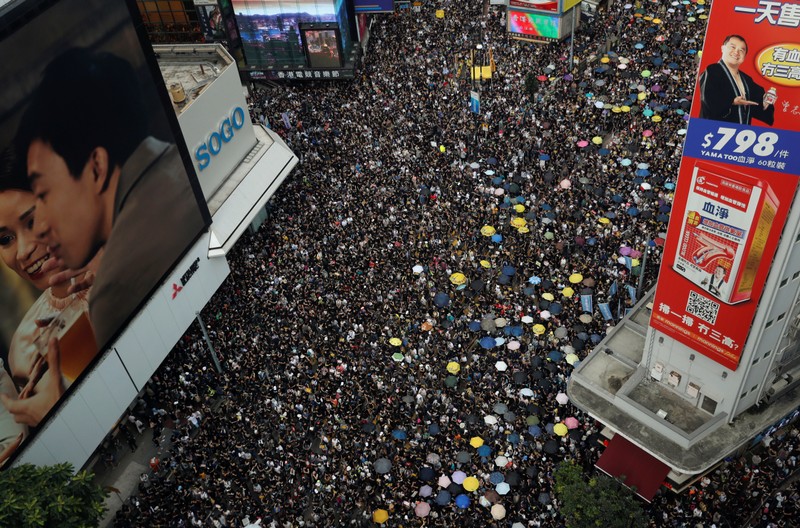 Anti-extradition demonstrators march to call for democratic reforms, in Hong Kong