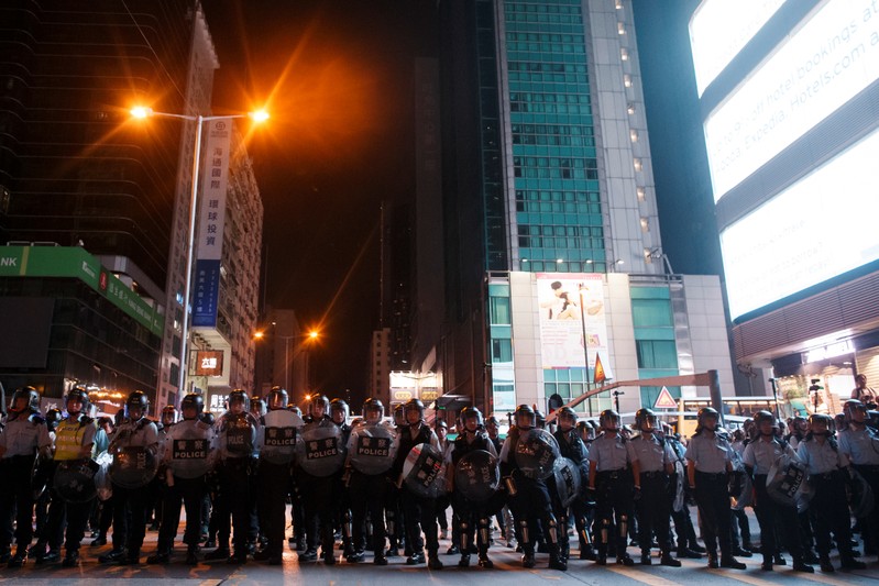 Riot police take position to disperse anti-extradition bill protesters after a march at Hong Kong’s tourism district Nathan Road near Mongkok