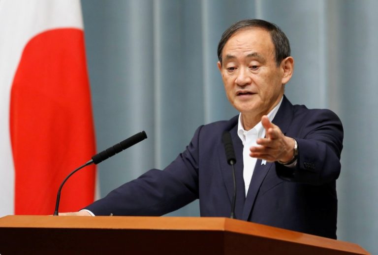Japan’s top government spokesman Suga, finance minister Aso to retain posts: Kyodo
