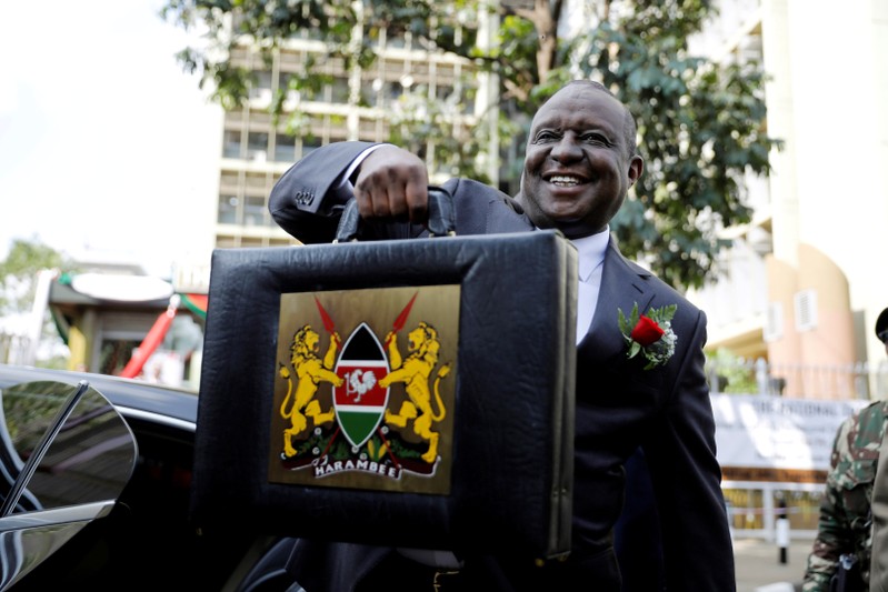 FILE PHOTO: Kenya's Cabinet Secretary for National Treasury Henry Rotich holds up a briefcase containing the Government Budget for the 2019/20 fiscal year in Nairobi