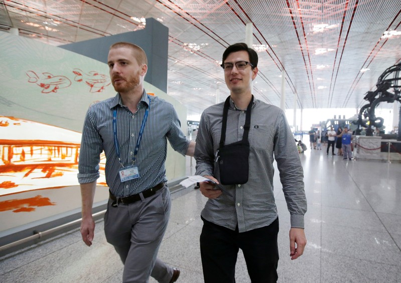An Australian student Alek Sigley, 29, who was detained in North Korea, departs from Beijing to Japan, at the Beijing international airport