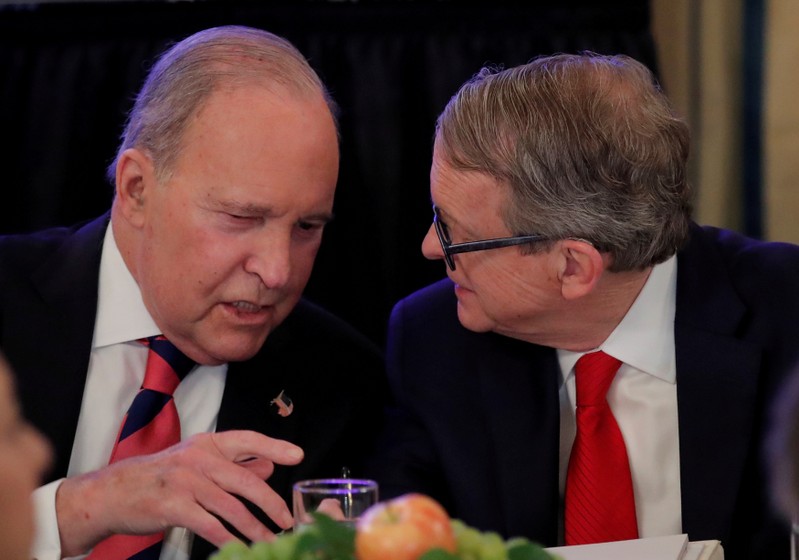 FILE PHOTO: White House economic adviser Larry Kudlow speaks with Ohio Governor Mike DeWine a meeting with U.S. Governors at the White House in Washington