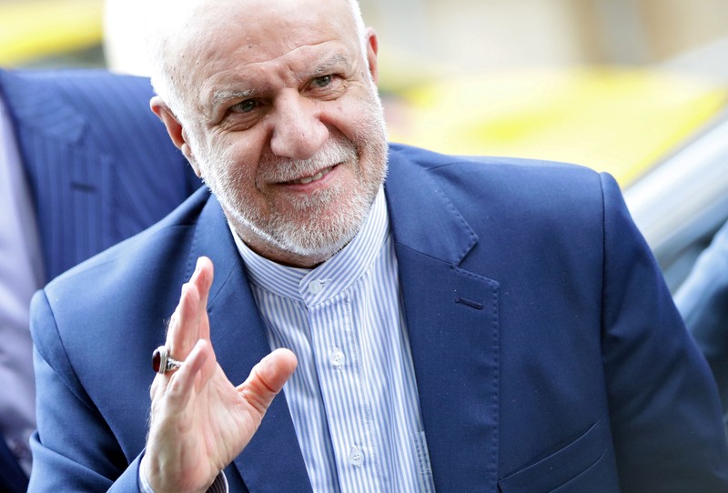 Iran's Oil Minister Bijan Zanganeh reacts towards journalists as he arrives for an OPEC and NON-OPEC meeting in Vienna