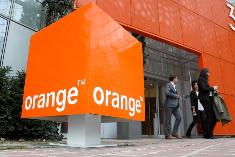 FILE PHOTO: The logo of French telecoms group Orange is seen at the entrance of the Cyberdefense division headquarters at Nanterre
