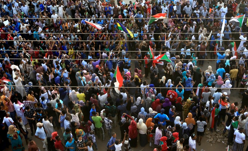Sudanese protesters march during a demonstration to commemorate the 40 days anniversary of the sit-in massacre in Khartoum North