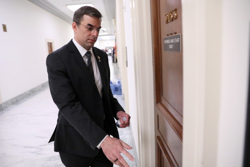 FILE PHOTO: U.S. Representative Amash arrives for a House Oversight Committee Hearing on Capitol Hill in Washington