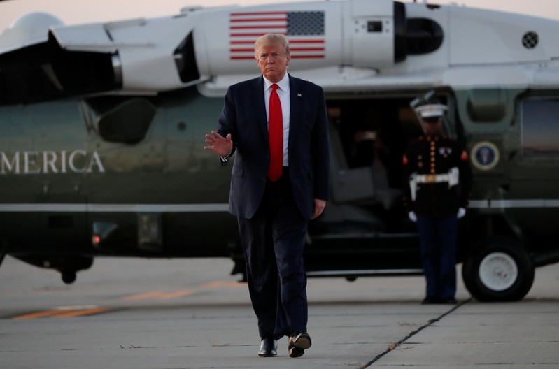 U.S. President Donald Trump after arriving from a fund-raising event before departing for Washington D.C., at Cleveland Hopkins International Airport in Cleveland