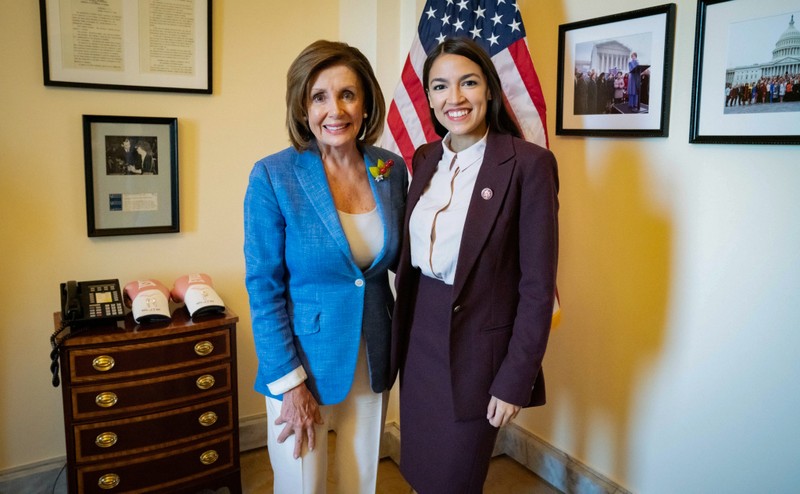 U.S. Speaker of the House Pelosi poses with Rep. Ocasio-Cortez after they met in the Speaker's office at the U.S. Capitol in Washington