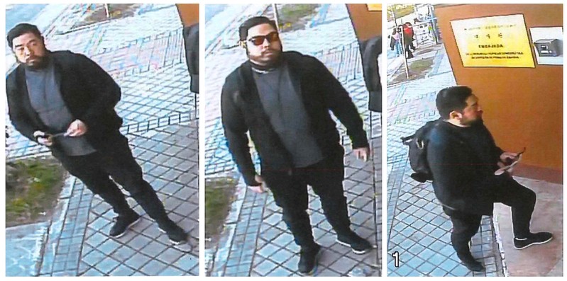 A combination photo of former U.S. Marine Christopher Philip Ahn allegedly shown in a still photos from a surveillance camera, standing in front of and entering the North Korea embassy in Madrid