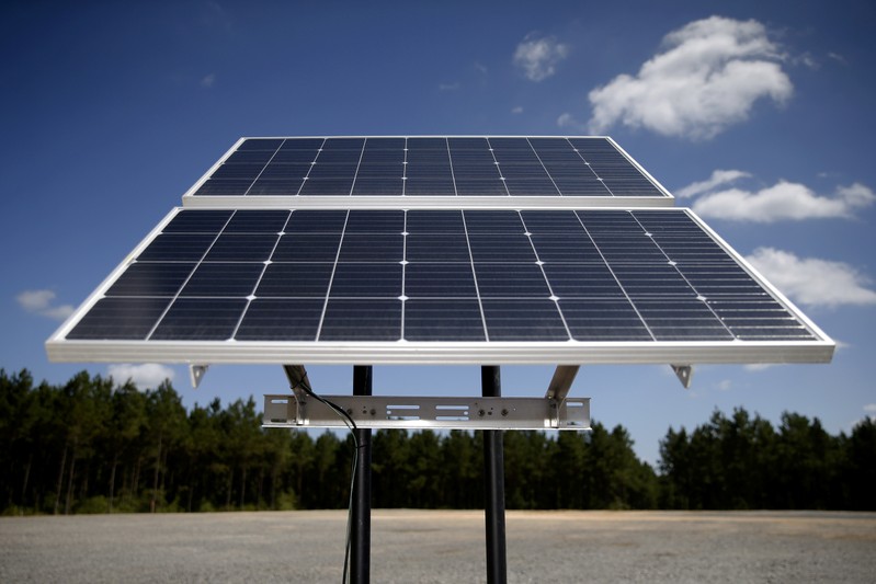 FILE PHOTO: Solar panels are pictured at the BP America Gasosaurus Gas Unit well site in Lufkin