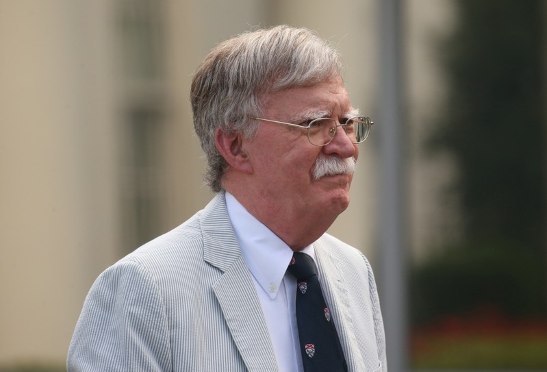 U.S. National Security Adviser John Bolton gives an interview to Fox News outside of the White House in Washington