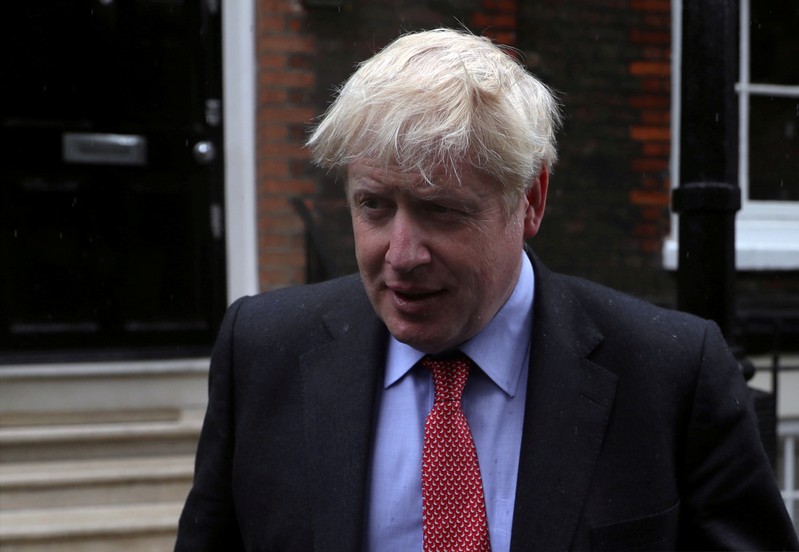 FILE PHOTO: Boris Johnson, a leadership candidate for Britain's Conservative Party, leaves offices in central in London