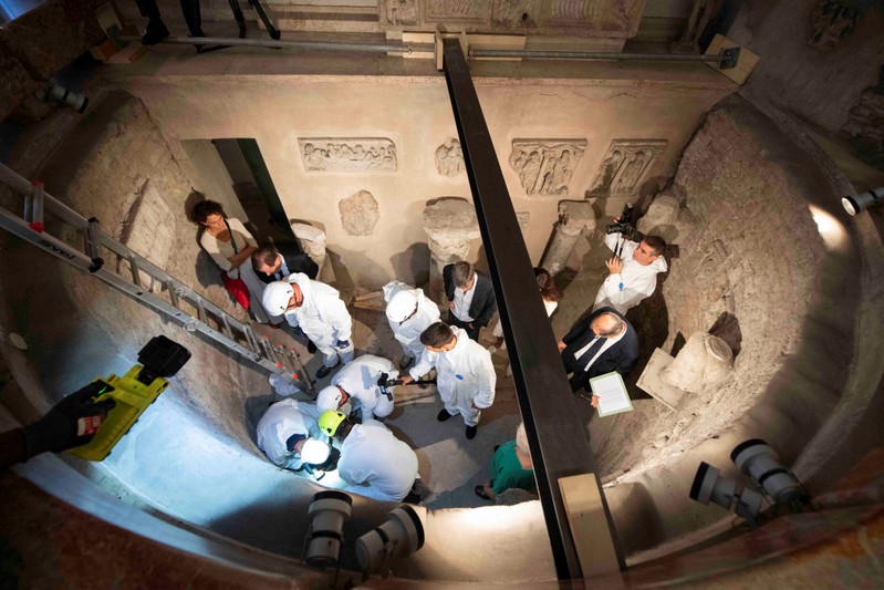 Experts open the ossuary at the Teutonic Cemetery at the Vatican