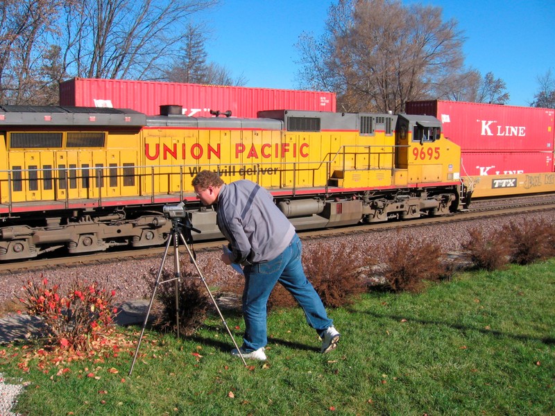 FILE PHOTO: FILE PHOTO - Wayne Davis films a passing Union Pacific train in Rochelle Illinois