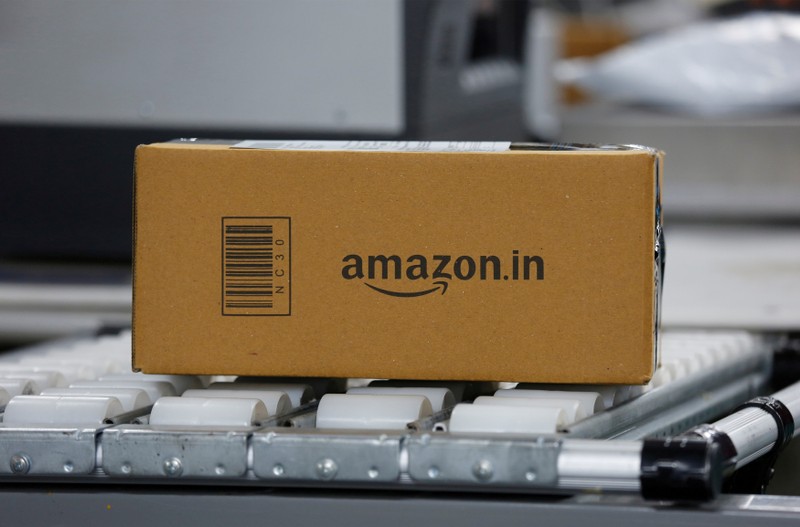 FILE PHOTO: A shipment moves on a conveyor belt at an Amazon fulfilment centre on the outskirts of Bengaluru