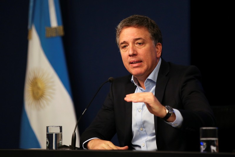 FILE PHOTO: Argentina's Treasury Minister Nicolas Dujovne gestures during a news conference in Buenos Aires
