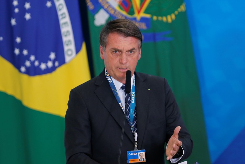 FILE PHOTO: Brazilian President Jair Bolsonaro speaks during the launching ceremony of the real estate credit program at the Planalto Palace in Brasilia