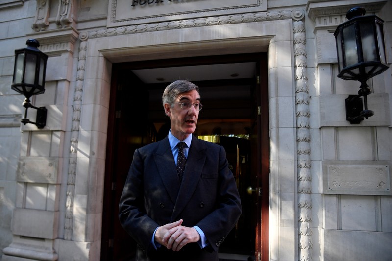 Britain's Lord President of the Council and Leader of the House of Commons Jacob Rees-Mogg talks to the media as he leaves media studios in London