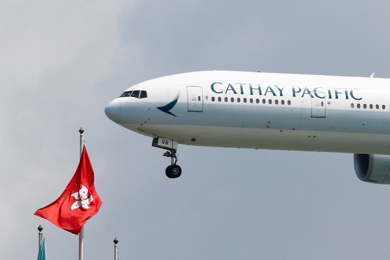 A Cathay Pacific Boeing 777 plane lands at Hong Kong airport after it reopened following clashes between police and protesters