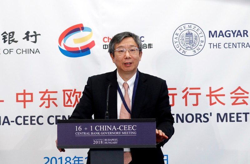 China's Central Bank Governor Yi Gang speaks during a conference in Budapest