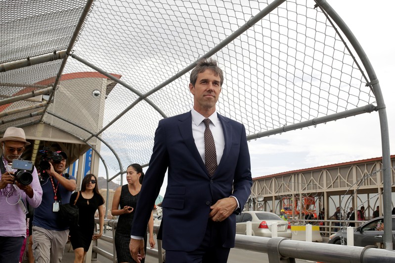 Democratic presidential candidate Beto O'Rourke crosses the Paso del Norte International border bridge to attend the funeral services of a victim of a mass shooting in El Paso, Texas, as seen from Ciudad Juarez