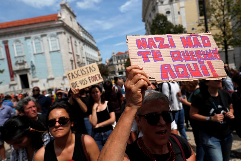Anti-fascist activists protest against a conference of far-right groups in downtown Lisbon