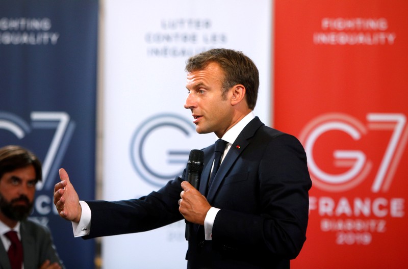 French President Emmanuel Macron delivers a speech during the G7 summit in Paris