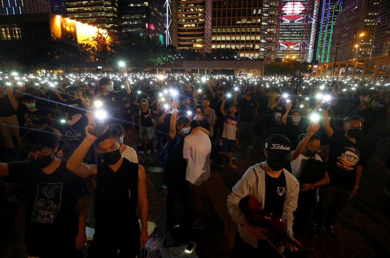 Students stage a rally to call for political reforms outside City Hall in Hong Kong