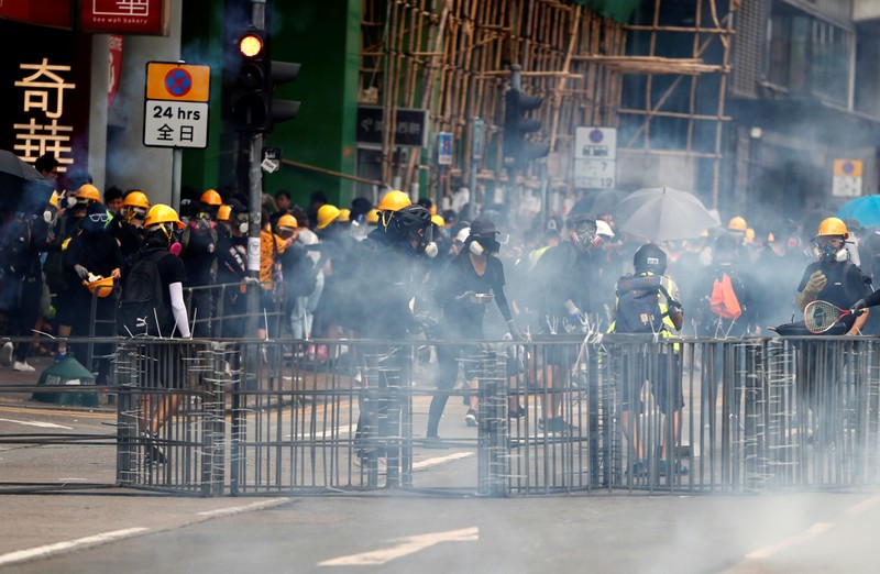Anti-extradition bill protesters set up a roadblock near Sham Shui Po Police Station in Hong Kong