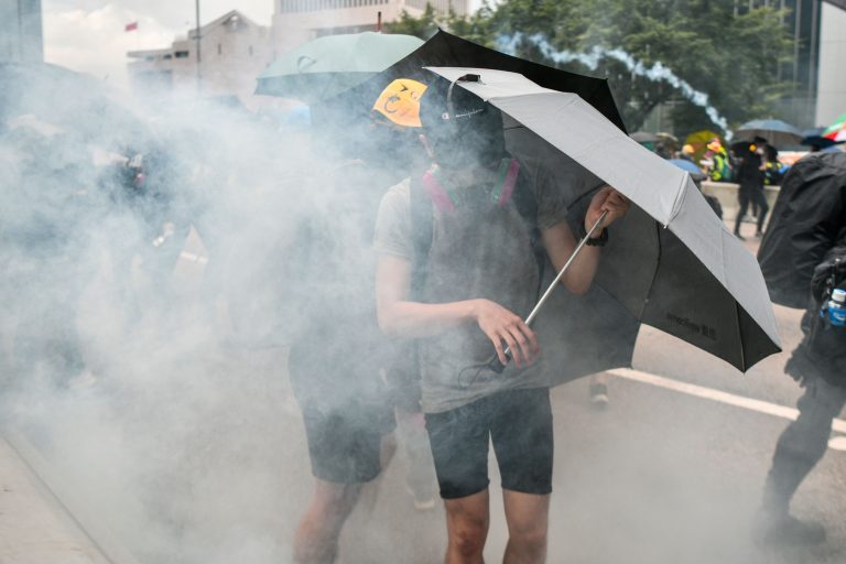 Hong Kong police fire tear gas, water cannon to disperse protests