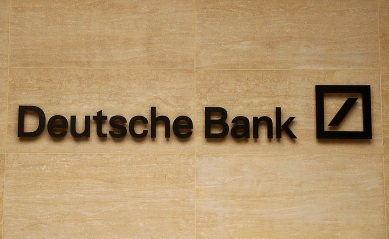 FILE PHOTO: The logo of Deutsche Bank is pictured on a company's office in London