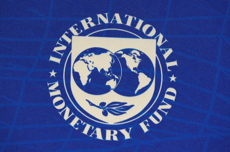 FILE PHOTO: The logo of the International Monetary Fund (IMF), is seen during a news conference in Santiago