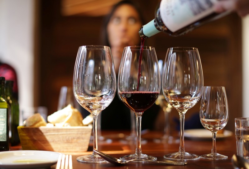 Visitors enjoy a wine-pairing menu at the Santa Julia winery of Familia Zuccardi, in Mendoza Province