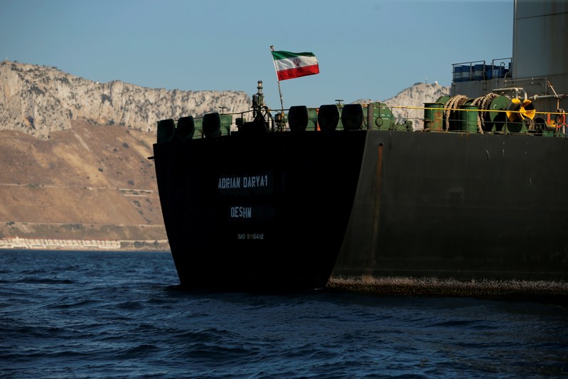 The Iranian flag flies on board the Iranian oil tanker Adrian Darya 1, formerly named Grace 1, as it sits anchored after the Supreme Court of the British territory lifted its detention order, in the Strait of Gibraltar