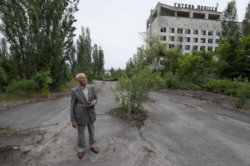 Ukrainian military pilot Mykola Volkozub visits the site of the Chernobyl nuclear disaster