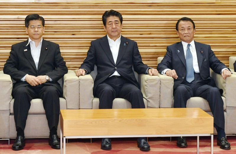Japan's Prime Minister Shinzo Abe attends his cabinet ministers' meeting in Tokyo
