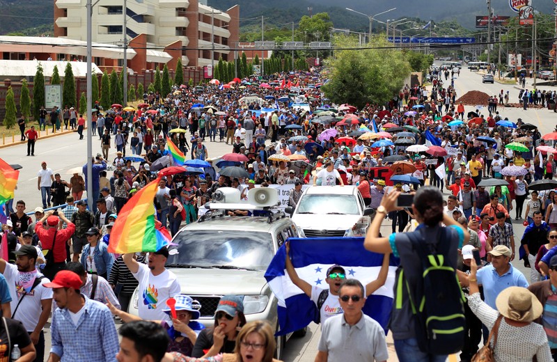 Demonstrators take part in a march against Honduran President Juan Orlando Hernandez, in Tegucigalpa